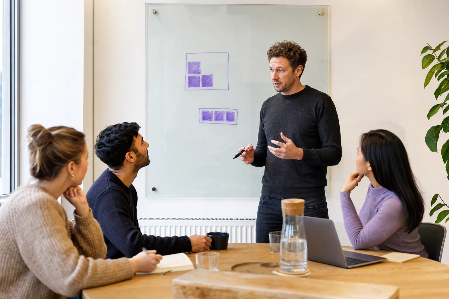 Startup founder explaining equity ownership to the company’s first employees